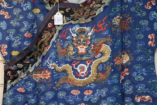 A Chinese blue satin embroidered silk and metal thread dragon robe, Jifu, late 19th / early 20th century,